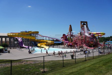Photo for Wisconsin Dells, Wisconsin USA - May 28th, 2023: Family members enjoy summer fun at LOST CITY OF ATLANTIS water rides at Mt. Olympus Water and Theme Park - Royalty Free Image