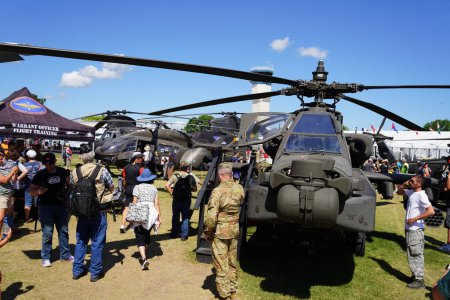 Photo for Oshkosh, Wisconsin USA - July 30th, 2022: Boeing AH-64 Apache attack helicopter was on display at EAA for spectators to see. - Royalty Free Image