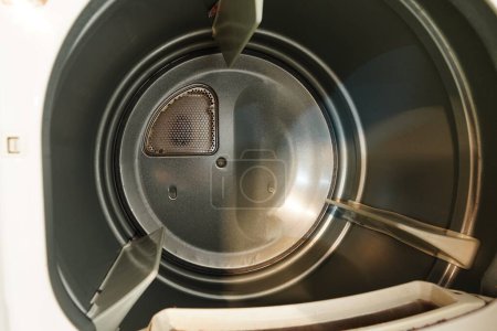 Photo for Washing Dryer Machine inside view of a drum. - Royalty Free Image