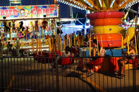 Photo for Fond du Lac, Wisconsin / USA - July 21st, 2019: Nightlife at Fond du Lac County Fair. Many of the community came out to enjoy much of the fun that happened during the summer - Royalty Free Image