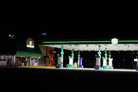 Photo for Camp Douglas, Wisconsin USA - September 2nd, 2022: BP British petroleum fuel station lights up the night to serve travelers. - Royalty Free Image