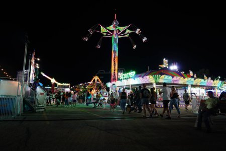Photo for Fond du Lac, Wisconsin USA - July 21st, 2023: Families came out during the night to enjoy playing fair games. - Royalty Free Image