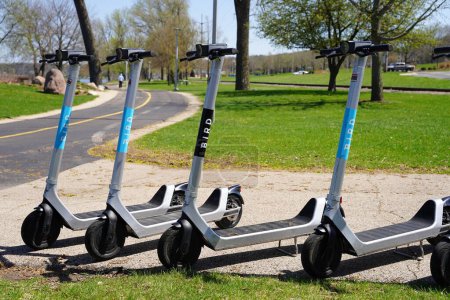 Photo for Rockford, Illinois USA - April 18th, 2023: Bird electric scooter eco-friendly transportation for riders. - Royalty Free Image