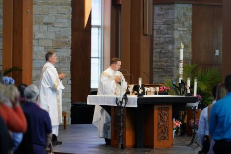 Photo for Fond du Lac, Wisconsin USA - June 14th, 2020: Sunday christian catholic religious communion mass service being held for the community - Royalty Free Image