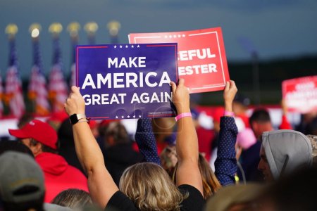 Photo for Mosinee, Wisconsin / USA - September 17th, 2020: Donald trump supporters holding up signs make america great again, pro life, cops for trump, peaceful protester, and 4 more years at president rally. - Royalty Free Image