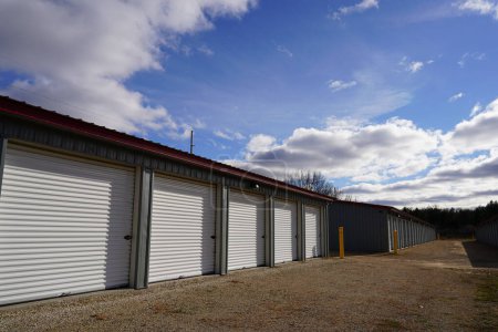 Photo for Oxford, Wisconsin USA - November 15th, 2022: Row of storage units used to hold property of owners - Royalty Free Image