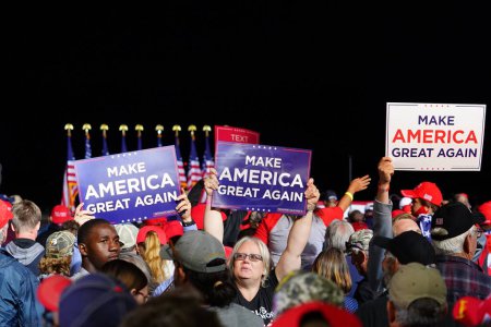 Photo for Mosinee, Wisconsin / USA - September 17th, 2020: Donald trump supporters holding up signs make america great again, pro life, cops for trump, peaceful protester, and 4 more years at president rally. - Royalty Free Image