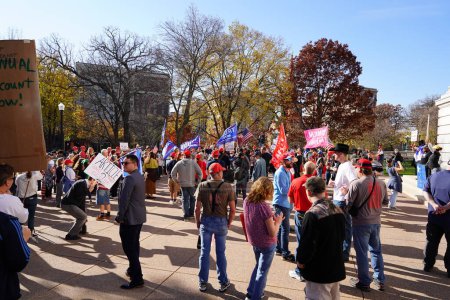 Photo for Madison, Wisconsin / USA - November 7th, 2020: Donald Trump supporters stand in protest on the grounds of madison capitol building protesting the 2020 presidential election results. - Royalty Free Image