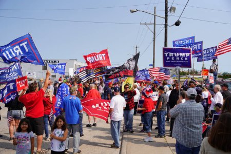 Photo for Manitowoc, Wisconsin / USA - September 21th, 2020: President trump and vice president mike pence supporters and joe biden and kamala harris supporters rallied together outside aluminum foundry. - Royalty Free Image