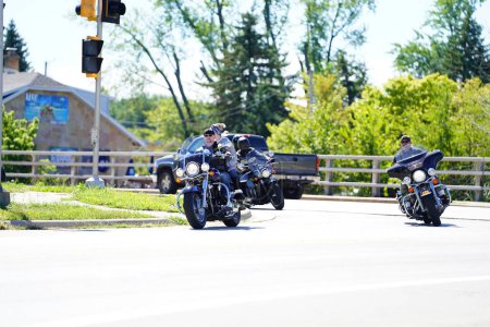 Photo for Green Bay, Wisconsin / USA - August 29th, 2020: Pro Trump blue lives matter motorcyclists, police vehicles and other vehicles drove through green bay as a parade to show support. - Royalty Free Image