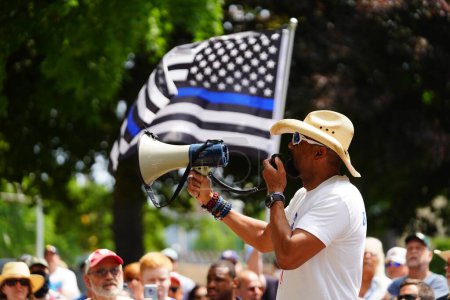 Photo for Kenosha, Wisconsin / USA - June 27th, 2020: Milwaukee County Sheriff David A. Clarke Jr attended and gave a speech at back the badge rally for blue lives matter law enforcement support rally. - Royalty Free Image