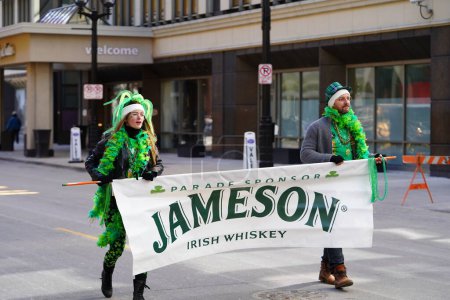 Photo for Milwaukee, Wisconsin USA - March 12th, 2022: Members of the St. Patrick's Day parade dressed up in Leprechaun costumes to celebrate the holiday. - Royalty Free Image
