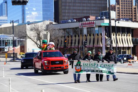 Photo for Milwaukee, Wisconsin USA - March 12th, 2022: Members of the St. Patrick's Day parade dressed up in Leprechaun costumes to celebrate the holiday - Royalty Free Image