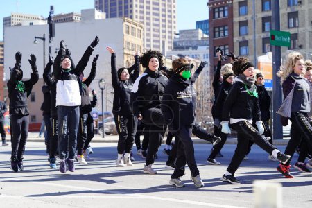 Photo for Milwaukee, Wisconsin USA - March 12th, 2022: Members McNamara McCarthy School of Irish Dance danced in St. Patrick's Day parade - Royalty Free Image