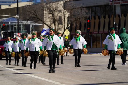 Photo for Milwaukee, Wisconsin USA - March 12th, 2022: Dancing Grannies danced around during St. Patrick's Day Irish parade celebration - Royalty Free Image