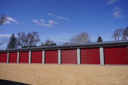 Photo for Red door storage units being used by the community - Royalty Free Image