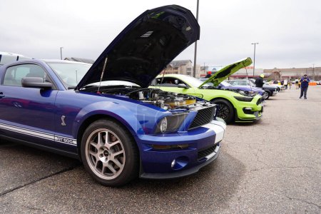 Photo for Baraboo, Wisconsin USA - April 30th, 2022: 2006 Dark Blue Ford Mustang GT 500 being shown off at Cruise for a Cause car show. - Royalty Free Image