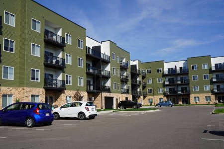 Photo for Madison, Wisconsin USA - May 13th, 2023: Modern apartment complex housing residents. - Royalty Free Image