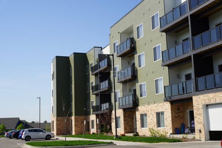 Photo for Madison, Wisconsin USA - May 13th, 2023: Modern apartment complex housing residents. - Royalty Free Image