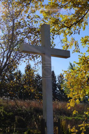 Photo for White holy christian cross standing up on the countryside of Fond du Lac, Wisconsin. - Royalty Free Image