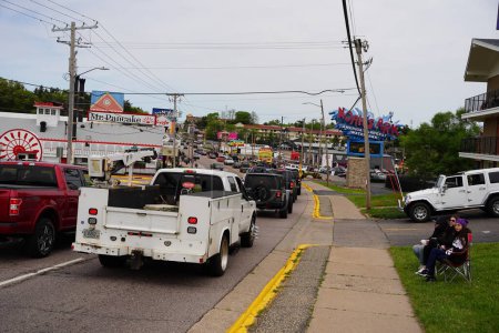 Photo for Wisconsin Dells, Wisconsin USA - May 21st, 2022: Various types of trucks and cars flooded the streets creating traffic during Automotion. - Royalty Free Image