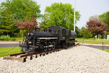 Photo for Green Bay, Wisconsin USA - May 23rd, 2023: Miniature Soo Line 2718 a H-23 class 4-6-2 Pacific steam locomotive replica sits in front of the National Railroad Museum. - Royalty Free Image