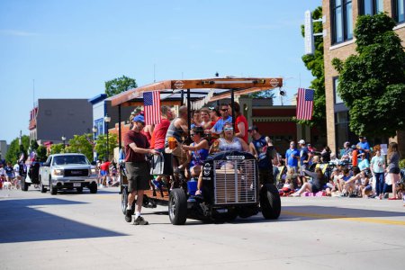 Photo for Sheboygan, Wisconsin / USA - July 4th, 2019: Many community members came out to be a spectator and watch 4th of july freedom pride festival parade marching downtown in the city. - Royalty Free Image
