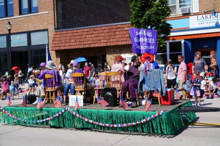 Photo for Sheboygan, Wisconsin USA - July 4th, 2022: Raging Grannies car riding on parade - Royalty Free Image