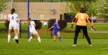 Photo for Oshkosh, Wisconsin USA - April 9th, 2022: Young adult female soccer players played in Oshkosh United Soccer club preseason tournament. - Royalty Free Image