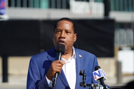 Photo for Milwaukee, Wisconsin USA - August 23rd, 2023: Conservative Radio Host Larry Elder gave interviews to press and media at the 2024 Presidential Republican debate at the Fiserv Forum. - Royalty Free Image