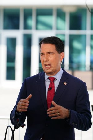 Photo for Milwaukee, Wisconsin USA - August 23rd, 2023: Former Governor of Wisconsin Scott Walker showed up at the 2024 Republican Presidential Debate at Fiserv Forum to give interviews to the press and media - Royalty Free Image