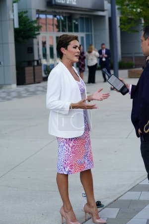 Photo for Milwaukee, Wisconsin USA - August 23rd, 2023: Former Arizona Republican nominee Kari Lake showed up at the 2024 Republican Presidential Debate at Fiserv Forum to give interviews to the press - Royalty Free Image