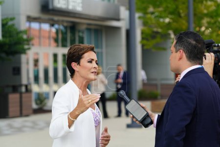 Photo for Milwaukee, Wisconsin USA - August 23rd, 2023: Former Arizona Republican nominee Kari Lake showed up at the 2024 Republican Presidential Debate at Fiserv Forum to give interviews to the press - Royalty Free Image