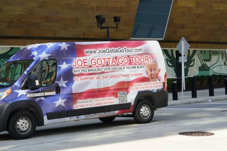 Photo for Milwaukee, Wisconsin USA - August 23rd, 2023: Vans and buses with anti Joe Biden signs drove around in the streets of Milwaukee during the Presidential Republican Debate - Royalty Free Image