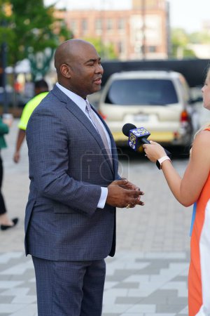 Photo for Milwaukee, Wisconsin USA - August 23rd, 2023: Representative Byron Donalds of Florida showed up at the 2024 Republican Presidential Debate at the Fiserv Forum to give interviews to the press and media - Royalty Free Image