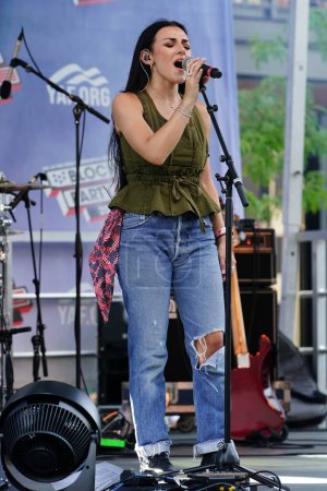 Photo for Milwaukee, Wisconsin USA - August 23rd, 2023: Alexis Wilkins a country singer sang pro-American songs at the 2024 Republican Presidential Debate at the Fiserv Forum. - Royalty Free Image