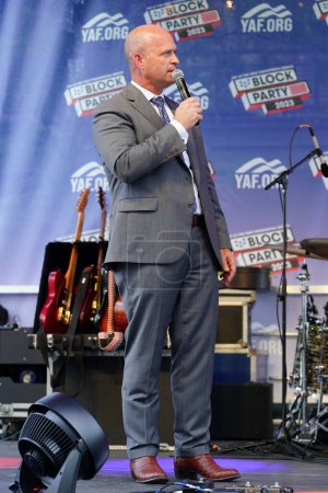 Photo for Milwaukee, Wisconsin USA - August 23rd, 2023: Kevin D. Roberts the president of The Heritage Foundation gave a speech on Young America's Foundation Block Party 2023 stage at the Fiserv Forum. - Royalty Free Image