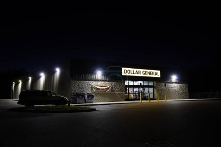 Photo for New Lisbon, Wisconsin USA - August 15th, 2023: Dollar General retail store at night. - Royalty Free Image
