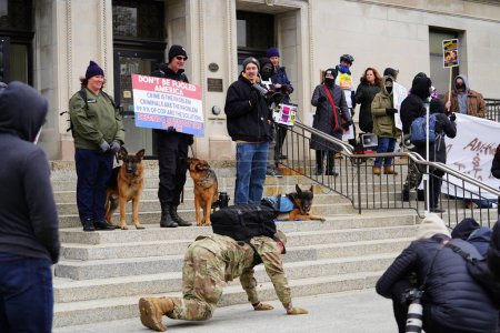 Photo for Kenosha, Wisconsin USA - November 18th, 2021: Protesters and supporters of Kyle Rittenhouse gather outside at Kenosha county courthouse during the jury deliberations of the case. - Royalty Free Image