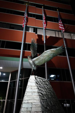 Photo for Neenah, Wisconsin / USA - October 27th, 2019: American Eagle Statue sculpture stands in front of Neenah City Center. - Royalty Free Image