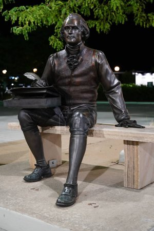 Photo for Neenah, Wisconsin / USA - August 14th, 2020: Night of photos of Thomas Jefferson landmark statue signing declaration of the Independence of the Public Art in Neenah, Wisconsin - Royalty Free Image