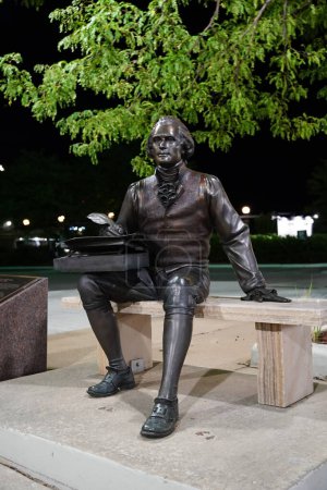 Photo for Neenah, Wisconsin / USA - August 14th, 2020: Night of photos of Thomas Jefferson landmark statue signing declaration of the Independence of the Public Art in Neenah, Wisconsin - Royalty Free Image