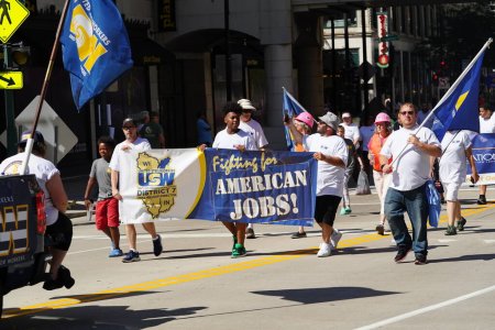 Photo for Milwaukee, Wisconsin USA - September 4th, 2023: Wisconsin worker Labor Unions and Teamsters marched in the streets of Milwaukee and marched to Summerfest grounds during the Labor Day Holiday - Royalty Free Image