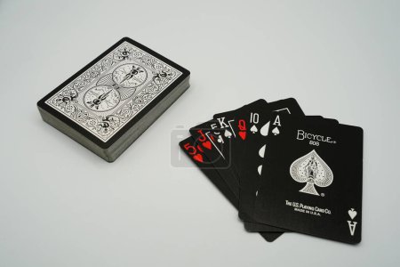 Photo for Fond du Lac, Wisconsin USA - March 25th, 2021: Deck of black faced professional playing cards. - Royalty Free Image