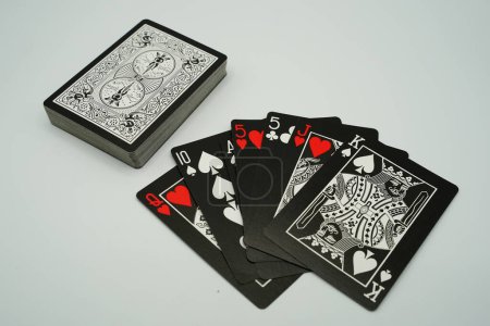 Photo for Fond du Lac, Wisconsin USA - March 25th, 2021: Deck of black-faced professional playing cards. - Royalty Free Image