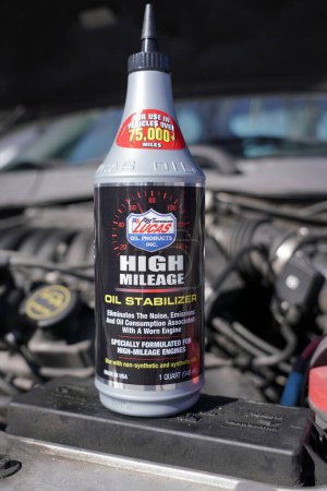 Photo for Fond du Lac, Wisconsin USA - March 6th, 2021: 1 quart of Lucas oil products inc. high mileage oil stabilizer. Eliminates the noise, emission, and oil consumption associated with a worn engine. - Royalty Free Image