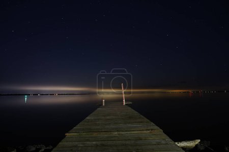 Photo for Night shot of Fond du Lac, Wisconsin, Lakeside park during the cold Winter season - Royalty Free Image