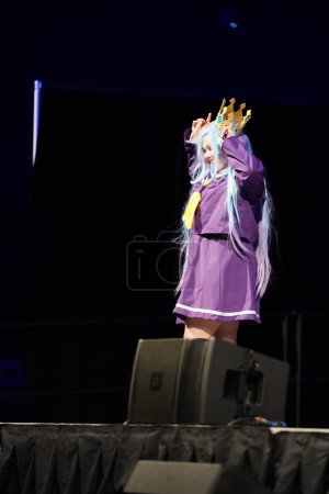 Photo for Milwaukee, Wisconsin USA - February 13th, 2020: Female dressed up in Marvel costumes, DC comics costumes, anime and manga costumes participating in anime milwaukee masquerade contest. - Royalty Free Image