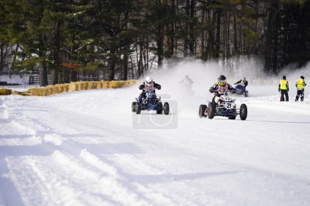 Photo for Hortonville, Wisconsin / USA - January 26th, 2019: Many riders on Quad-bikes and ATVs were having fun riding around on snow covered frozen iced lake. - Royalty Free Image