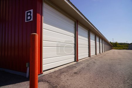 Photo for Red and Tan storage units holding the owner's property. - Royalty Free Image